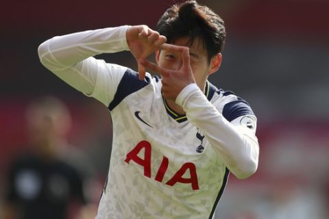 Tottenham's Son Heung-min celebrates after scoring his side's second goal during the English Premier League soccer match between Southampton and Tottenham Hotspur at St. Mary's Stadium in Southampton, England, Sunday, Sept. 20, 2020. (Cath Ivill/Pool via AP)