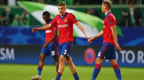 WOLFSBURG, GERMANY - SEPTEMBER 15:  (L-R) Ahmed Musa, Pontus Wernbloom and Vasiliy Berezutskiy of CSKA Moscow look dejected in defeat after the UEFA Champions League Group B match between VfL Wolfsburg and PFC CSKA Moskva at Volkswagen Arena on September 15, 2015 in Wolfsburg, Germany.  (Photo by Martin Rose/Bongarts/Getty Images)