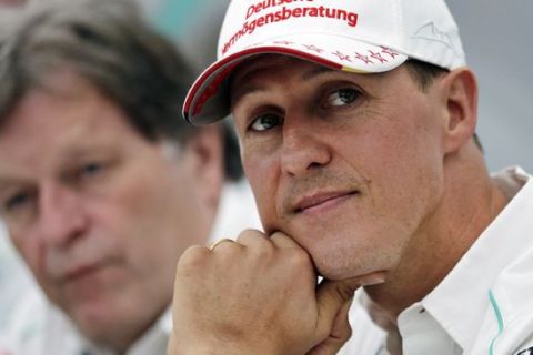 FILE - In this Thursday, Oct. 4, 2012 file photo, former Mercedes F1 driver Michael Schumacher of Germany pauses during a news conference to announce his retirement from Formula One at the end of  2012 in Suzuka, Japan. Former Ferrari president Luca di Montezemolo has expressed his sadness at the condition of Michael Schumacher, two years after the former Formula One champion was seriously injured in a skiing accident. Montezemolo was asked at a media event Thursday, Feb. 4, 2016 in Milan if he had any news about Schumacher, who sustained severe head injuries in France in December 2013 and is being cared for at his home in Switzerland. Montezemolo says: Unfortunately it's not good, it's not as good as one would have hoped. (AP Photo/Shizuo Kambayashi, File)