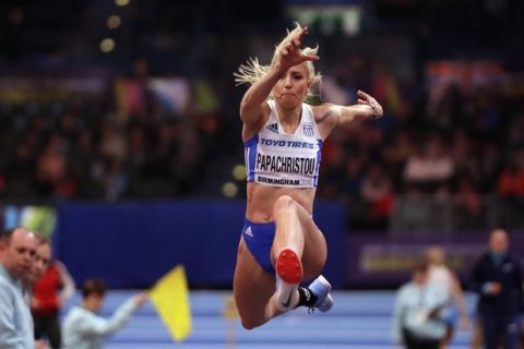 Greece's Paraskevi Papachristou makes an attempt in the women's triple jump final at the World Athletics Indoor Championships in Birmingham, Britain, Saturday, March 3, 2018. (AP Photo/Matt Dunham)