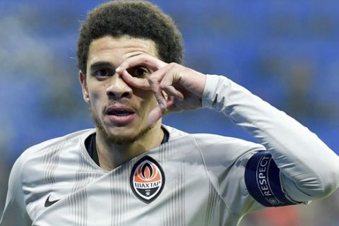 Shakhtar's Taison celebrates after scoring his side's second goal during the soccer Champions League match between 1899 Hoffenheim and Shakhtar Donetsk in Sinsheim, southern Germany, Tuesday, Nov. 27, 2018. (Uwe Anspach/dpa via AP)