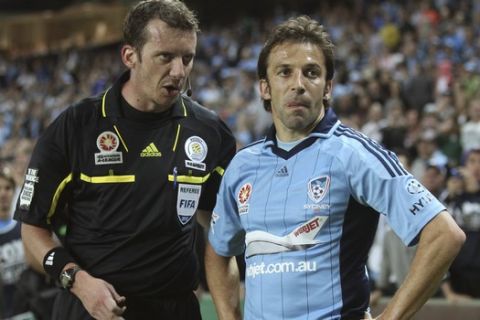 Referee Peter Green speaks to Sydney FC's Alessandro Del Piero, right, during their A-League match against Adelaide United in Sydney, Australia, Friday, Nov. 23, 2012. (AP Photo/Rob Griffith)
