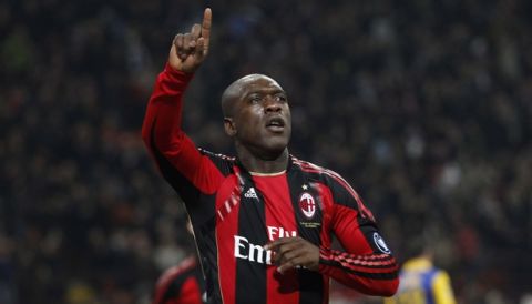 AC Milan midfielder Clarence Seedorf, of the Netherlands, celebrates after scoring during a Serie A soccer match between AC Milan and Parma at the San Siro stadium in Milan, Italy, Saturday , Feb. 12, 2011. (AP Photo/Luca Bruno)