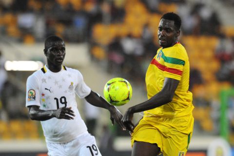 Mali's striker Cheick Diabate (R) vies for the ball with Ghana's Jonathan Mensah during the third-place play-off African Cup of Nations football match between Ghana and Mali, in Malabo, on Febuary 11, 2012. AFP PHOTO / ALEXANDER JOE (Photo credit should read ALEXANDER JOE/AFP/Getty Images)