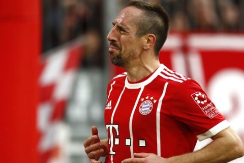 Bayern's Franck Ribery celebrates after scoring his side's fifth goal during the German Soccer Bundesliga match between FC Bayern Munich and Hamburger SV in Munich, Germany, Saturday, March 10, 2018. (AP Photo/Matthias Schrader)