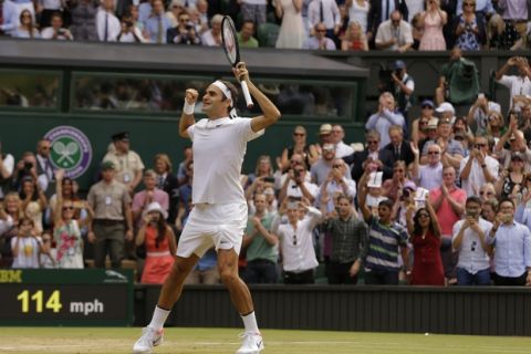 Switzerland's Roger Federer celebrates after defeating Croatia's Marin Cilic to win the Men's Singles final match on day thirteen at the Wimbledon Tennis Championships in London Sunday, July 16, 2017. (AP Photo/Alastair Grant)