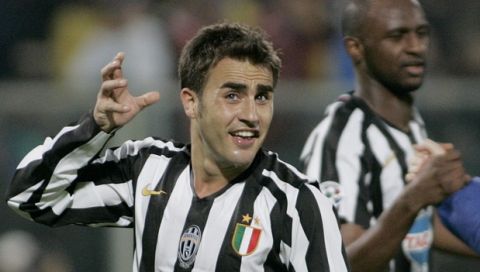 Juventus defender Fabio Cannavaro reacts as teammate Patrick Vieira of France is seen in background, during the Italian first division soccer match between Juventus and Fiorentina, at the Florence stadium, Italy, Sunday, Dec. 4, 2005. Juventus 2-1. (AP Photo/Lorenzo Galassi)
