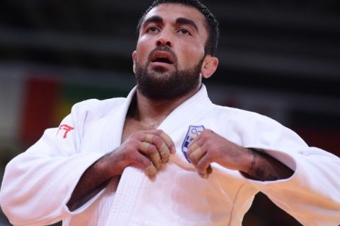 Greece's Ilias Iliadis celebrates after winning his men's -90kg judo contest bronze medal match of the London 2012 Olympic Games on August 1, 2012 at the ExCel arena in London. AFP PHOTO / FRANCK FIFE        (Photo credit should read FRANCK FIFE/AFP/GettyImages)