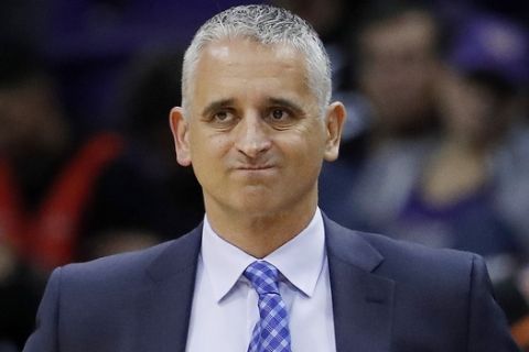 FILE - In this Jan. 24, 2019, file photo, Phoenix Suns head coach Igor Kokoskov watches during the second half of an NBA basketball game against the Portland Trail Blazers. The Suns say they have fired Kokoskov after one season. (AP Photo/Matt York, File)