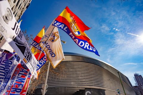 Madrid, Spain. Street stall selling Real Madrid scarves and flags in the vicinity of the Santiago Bernabeu stadium on match day