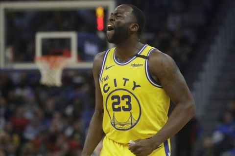 Golden State Warriors forward Draymond Green (23) reacts against the Los Angeles Lakers during an NBA basketball game in San Francisco, Thursday, Feb. 27, 2020. (AP Photo/Jeff Chiu)