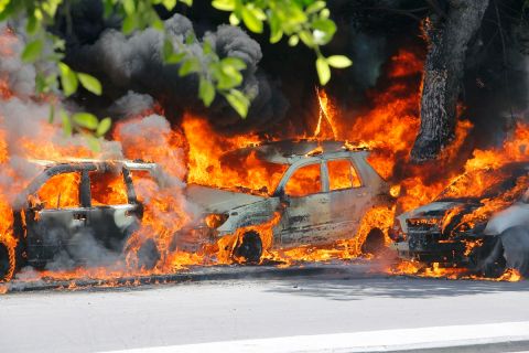 Cars burn after a poweful car bomb in Mogadishu, Somalia, Wednesday, April 17, 2019.(AP Photo/Farah Abdi Warsameh)