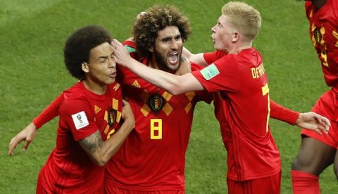 Belgium's Marouane Fellaini, center, celebrates with teammates after scoring his second side goal during the round of 16 match between Belgium and Japan at the 2018 soccer World Cup in the Rostov Arena, in Rostov-on-Don, Russia, Monday, July 2, 2018. (AP Photo/Hassan Ammar)