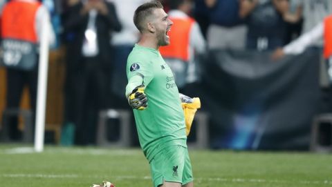 Liverpool's goalkeeper Adrian celebrates after winning the UEFA Super Cup soccer match between Liverpool and Chelsea, in Besiktas Park, in Istanbul, Thursday, Aug. 15, 2019. Liverpool won 5-4 in a penalty shootout after the game ended tied 2-2. (AP Photo/Thanassis Stavrakis)