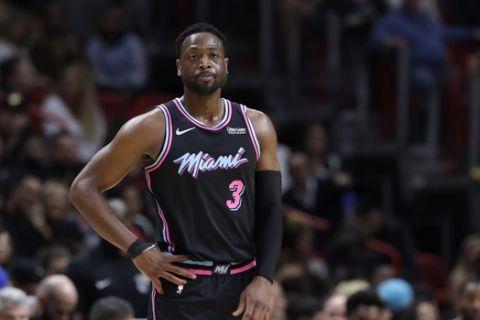 Miami Heat guard Dwyane Wade (3) stands on the court during the second half of an NBA basketball game against the Atlanta Hawks, Tuesday, Nov. 27, 2018, in Miami. The Hawks won 115-113. (AP Photo/Lynne Sladky)