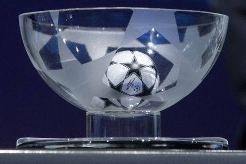 A ball containing the names of the soccer clubs, during the drawing of the games for the Champions League 2009/10 Play Off round, at the UEFA Headquarters in Nyon, Switzerland, Friday, Aug. 7, 2009. (AP Photo/Keystone/Salvatore Di Nolfi)