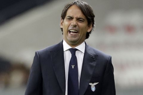 FILE - In this Thursday, Oct. 19, 2017 file photo, Lazio coach Simone Inzaghi reacts on the sidelines during a Europa League group K soccer match between OGC Nice and Lazio at the Allianz Riviera stadium in Nice, French Riviera. Young coach Simone Inzaghi has Lazio playing attractive football and the capital side is challenging on three fronts this season. It is also in the semifinals of the Italian Cup and in the knockout stages of the Europa League. (AP Photo/Claude Paris, File)