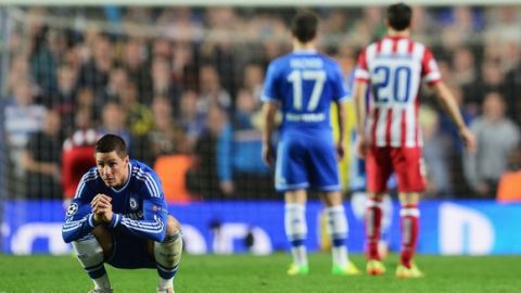 LONDON, ENGLAND - APRIL 30: Fernando Torres of Chelsea looks away as Diego Costa of Club Atletico de Madrid prepares to take his penalty during the UEFA Champions League semi-final second leg match between Chelsea and Club Atletico de Madrid at Stamford Bridge on April 30, 2014 in London, England.  (Photo by Jamie McDonald/Getty Images)