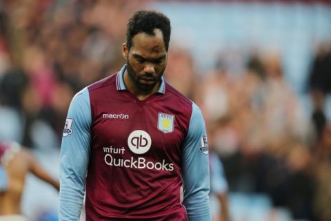 BRIMINGHAM, ENGLAND - OCTOBER 24:  A dejected Joleon Lescott of Aston Villa at the end of the Barclays Premier League match between Aston Villa and Swansea City at Villa Park on October 24, 2015 in Birmingham, England.  (Photo by Matthew Ashton - AMA/Getty Images)