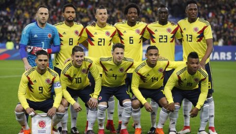 The Columbian national soccer team poses before a friendly soccer match against France at the Stade de France stadium in Saint-Denis, outside Paris, France, Friday March 23, 2018. First row from left to right : Radamel Falcao, James Rodriguez, Santiago Arias, Luis Fernando Muriel and Frank Fabra. Second row from left to right : David Ospina, Abel Aguilar, Mateus Uribe, Carlos Alberto Sanchez, Davison Sanchez and Yerry Mina. (AP Photo/Francois Mori)