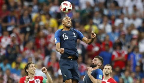 France's Steven Nzonzi heads the ball during the final match between France and Croatia at the 2018 soccer World Cup in the Luzhniki Stadium in Moscow, Russia, Sunday, July 15, 2018. (AP Photo/Matthias Schrader)