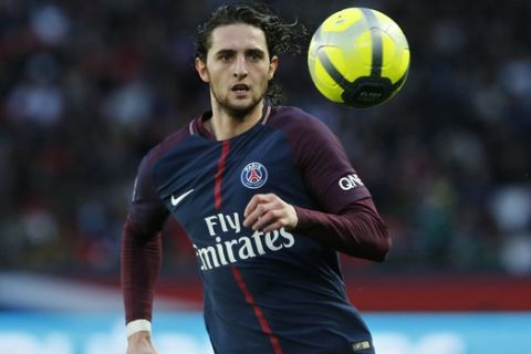 PSG's Adrien Rabiot runs after the ball during the French League One soccer match between Paris Saint-Germain and Metz at the Parc des Princes Stadium, in Paris, France, Saturday, March 10, 2018. (AP Photo/Thibault Camus)
