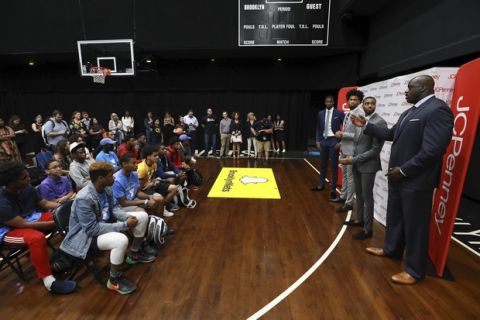 IMAGE DISTRIBUTED FOR JCPENNEY - Shaquille O'Neal, JCPenney's Big &Tall Ambassador, along with NBA draft prospects Jaren Jackson Jr., Marvin Bagley III, and Mikal Bridges team up with JCPenney to host a day of mentorship for deserving young men from The Y at Barclays Center on Friday, June 15, 2018, in Brooklyn, N.Y. (Mark Von Holden/AP Images for JCPenney)