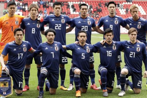FILE - In this March 27, 2018, file photo, Japan's national team poses for a team picture prior to an international friendly soccer match between Japan and Ukraine at Maurice Dufrasne Stadium in Liege, Belgium. Japan is expected to name its 23-man squad for the World Cup on May 31, several days ahead of the June 4 deadline set by soccer's world governing body FIFA. (AP Photo/Olivier Matthys, File)