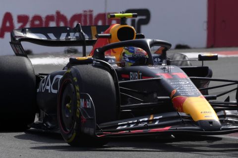Red Bull driver Sergio Perez of Mexico steers his car during the Formula One Grand Prix at the Baku circuit, in Baku, Azerbaijan, Sunday, April 30, 2023. (AP Photo/Darko Bandic)