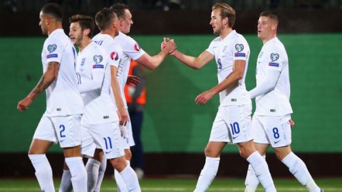KAUNAS, LITHUANIA - OCTOBER 12:  Harry Kane of England (10) celebrates with Phil Jones (4L) as his shot rebounds off goalkeeper Giedrius Arlauskis of Lithuania (not pictured) for an own goal and England's second during the UEFA EURO 2016 qualifying Group E match between Lithuania and England at LFF Stadionas on October 12, 2015 in Kaunas, Lithuania.  (Photo by Alex Livesey/Getty Images)