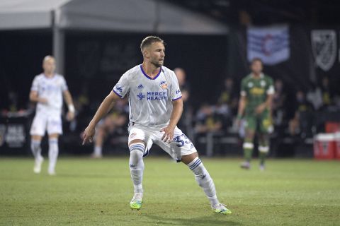 FC Cincinnati midfielder Caleb Stanko (33) sets up for a play during the first half of an MLS soccer match against the Portland Timbers, Tuesday, July 28, 2020, in Kissimmee, Fla. (AP Photo/Phelan M. Ebenhack)