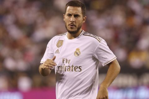 Real Madrid forward Eden Hazard in action during the second half of an International Champions Cup soccer match against Atletico Madrid, Friday, July 26, 2019, in East Rutherford, N.J. Atletico Madrid won 7-3. (AP Photo/Steve Luciano)