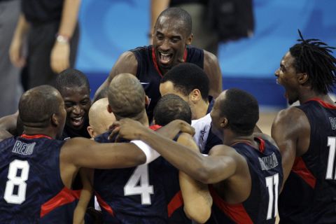 FILE - USA's Kobe Bryant, top center, celebrates with teammates after beating Spain in the men's gold medal basketball game at the Beijing 2008 Olympics in Beijing, Aug. 24, 2008. (AP Photo/Charlie Riedel, File)