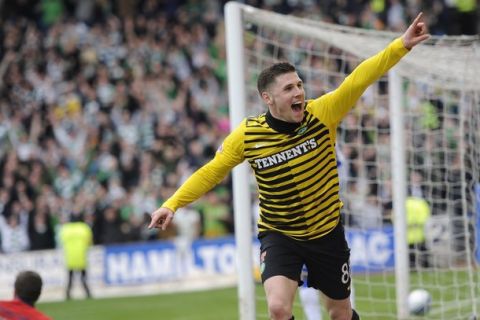 Celtic's Gary Hooper celebrates his goal against Kilmarnock during their Scottish Premier League soccer match at Rugby Park Stadium in Kilmarnock, Scotland, April 7, 2012.  REUTERS/Russell Cheyne (BRITAIN - Tags: SPORT SOCCER)