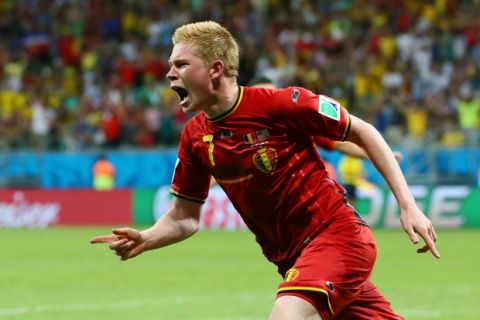SALVADOR, BRAZIL - JULY 01: Kevin De Bruyne of Belgium celebrates after scoring his team's first goal in extra time during the 2014 FIFA World Cup Brazil Round of 16 match between Belgium and the United States at Arena Fonte Nova on July 1, 2014 in Salvador, Brazil.  (Photo by Kevin C. Cox/Getty Images)