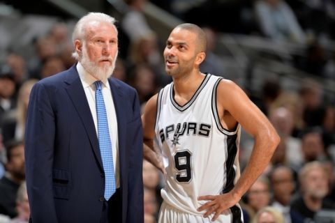 SAN ANTONIO, TX - JANUARY 17: Head Coach Gregg Popovich and Tony Parker #9 of the San Antonio Spurs are seen against the Minnesota Timberwolves on January 17, 2017 at the AT&T Center in San Antonio, Texas. NOTE TO USER: User expressly acknowledges and agrees that, by downloading and or using this photograph, user is consenting to the terms and conditions of the Getty Images License Agreement. Mandatory Copyright Notice: Copyright 2017 NBAE (Photos by Mark Sobhani/NBAE via Getty Images)