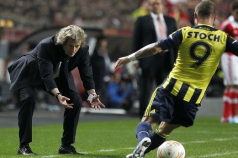 Benfica's coach Jorge Jesus, left, reacts in front of Fenerbahce's Miroslav Stoch, from Slovakia, during the Europa League semi final second leg soccer match between Fenerbahce against Benfica at Benfica's Luz stadium in Lisbon, Thursday, May 2, 2013. Benfica won the match 3-2 on aggregate and will play the final in Amsterdam on May 15. (AP Photo/Francisco Seco)