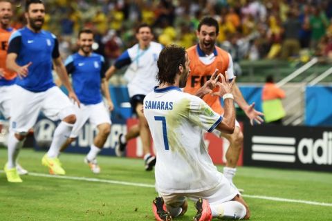 FORTALEZA, BRAZIL - JUNE 24:  Giorgos Samaras of Greece celebrates scoring his team's second goal on a penalty kick during the 2014 FIFA World Cup Brazil Group C match between Greece and the Ivory Coast at Castelao on June 24, 2014 in Fortaleza, Brazil.  (Photo by Laurence Griffiths/Getty Images)