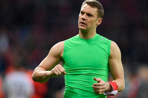 Bayern goalkeeper Manuel Neuer reacts to fans after the German Bundesliga soccer match between Bayer Leverkusen and Bayern Munich in Leverkusen, Germany, Saturday, April 15, 2017. The match ended 0-0. (AP Photo/Martin Meissner)