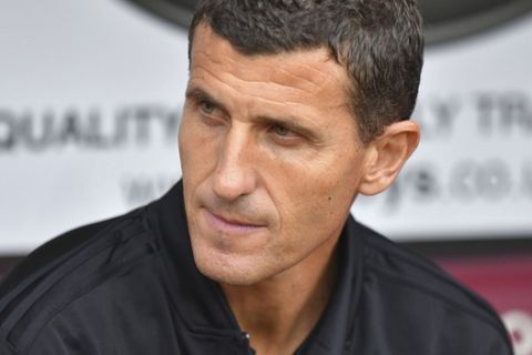 Watford manager Javi Gracia looks out during the game against Burnley, during their English Premier League soccer match at Turf Moor in Burnley, England, Sunday Aug. 19, 2018. (Dave Howarth/PA via AP)