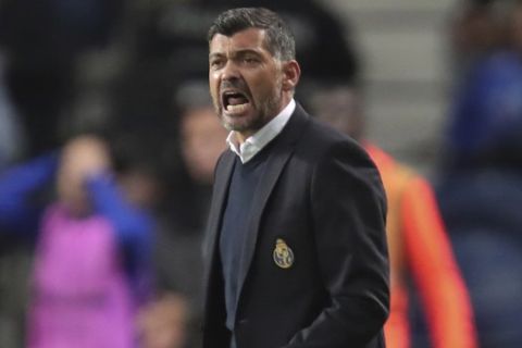Porto's head coach Sergio Conceicao shouts during the Europa League group G soccer match between FC Porto and Rangers FC at the Dragao stadium in Porto, Portugal, Thursday, Oct. 24, 2019. (AP Photo/Luis Vieira)