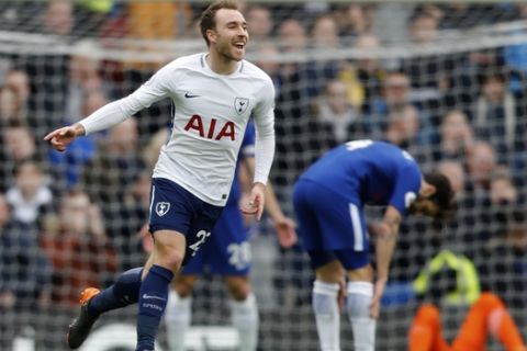 Tottenham's Christian Eriksen celebrates after scoring his side's first goal during the English Premier League soccer match between Chelsea and Tottenham Hotspur at Stamford Bridge stadium in London, Sunday, April 1, 2018. (AP Photo/Frank Augstein)