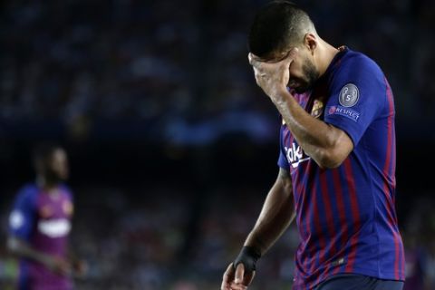 Barcelona forward Luis Suarez reacts during the group B Champions League soccer match between FC Barcelona and PSV Eindhoven at the Camp Nou stadium in Barcelona, Spain, Tuesday, Sept. 18, 2018. (AP Photo/Manu Fernandez)