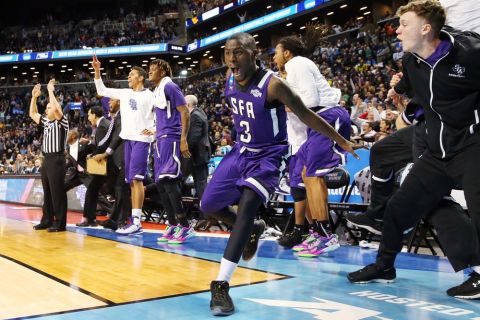 Mar 18, 2016; Brooklyn, NY, USA; Stephen F. Austin Lumberjacks guard Jared Johnson (3) and teammates celebrate on the bench against the West Virginia Mountaineers in the second half in the first round of the 2016 NCAA Tournament at Barclays Center. Mandatory Credit: Anthony Gruppuso-USA TODAY Sports ORG XMIT: USATSI-264942 ORIG FILE ID:  20160318_jel_ag9_195.jpg