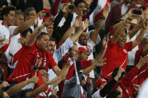 Peru fans cheers after defeating New Zealand 2-0 and and getting the last slot to the 2018 Russia World Cup, in Lima, Peru, Wednesday, Nov. 15, 2017. (AP Photo/Karel Navarro)