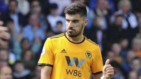 Wolverhampton Wanderers' Ruben Neves gestures during the English Premier League soccer match between Wolverhampton Wanderers and Manchester City at the Molineux Stadium in Wolverhampton, England, Saturday, Aug. 25, 2018. (AP Photo/Rui Vieira)