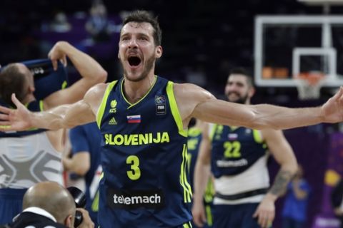 Slovenia's Goran Dragic celebrates at the end of their Eurobasket European Basketball Championship semifinal match against Spain in Istanbul, Thursday, Sept. 14, 2017. Slovenia won 92-72. (AP Photo/Thanassis Stavrakis)