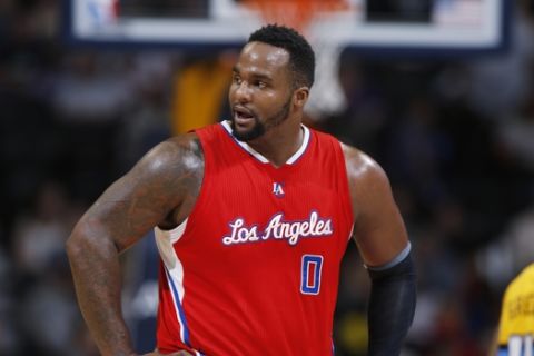 Los Angeles Clippers forward Glen Davis (0) looks on against the Denver Nuggets in the third quarter of an NBA basketball game Saturday, April 4, 2015, in Denver. The Clippers won 107-92. (AP Photo/David Zalubowski)