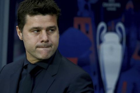 Tottenham coach Mauricio Pochettino waits for the start of the Champions League quarterfinal, second leg, soccer match between Manchester City and Tottenham Hotspur at the Etihad Stadium in Manchester, England, Wednesday, April 17, 2019. (AP Photo/Dave Thompson)