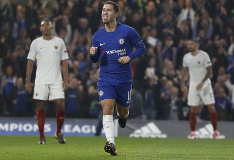 Chelsea's Eden Hazard celebrates after scoring during the Champions League group C soccer match between Chelsea and Roma at Stamford Bridge stadium in London, Wednesday, Oct. 18, 2017. (AP Photo/Kirsty Wigglesworth)